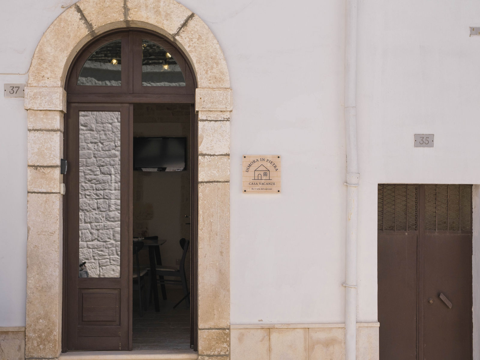 Portone ad arco in pietra di Dimora in Pietra